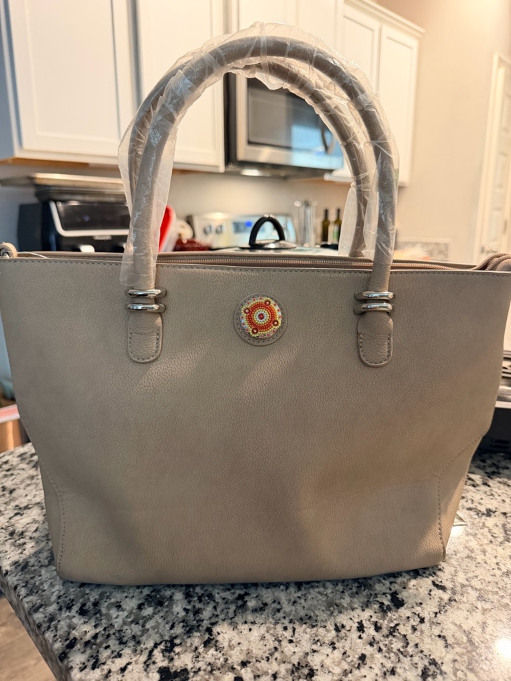 Neutral Beige Tote with Decorative Medallion Accent